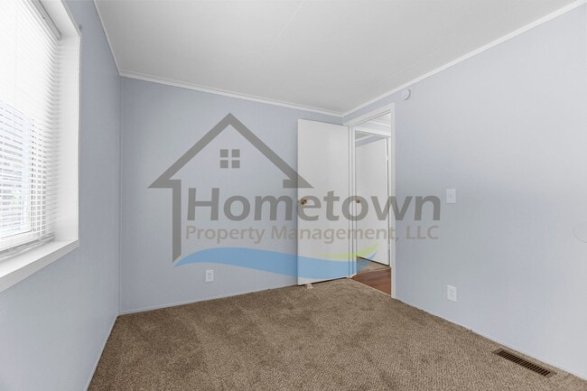 Building Photo - 3 Bedroom 2 Bathroom Home with Off-Street ...
