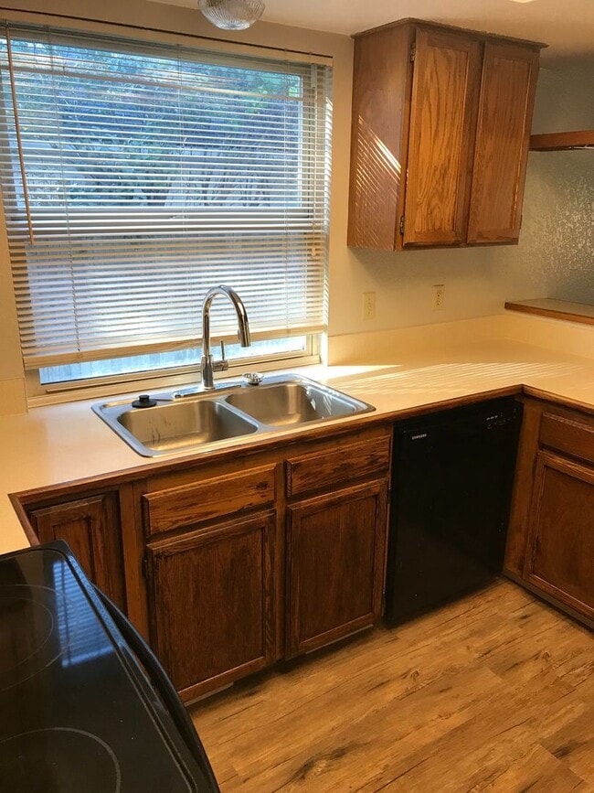 Building Photo - Coming in March – Beautiful Single-Story Home with Dual Living Spaces & Fenced Yard