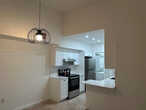 Building Photo - 3241 Sabal Palm Manor