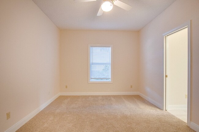 Building Photo - Festive Move-In Special! 4BR/3BA Lenox Gem – Fully Fenced Backyard & Military ½ Deposit