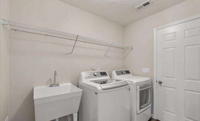 Building Photo - 4995 N Tasman Dr