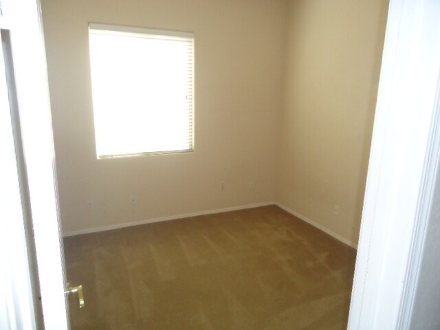 Building Photo - Great 4/3 house for rent in gated communit...