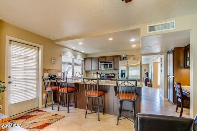 Building Photo - 7129 N Vía De Alegria