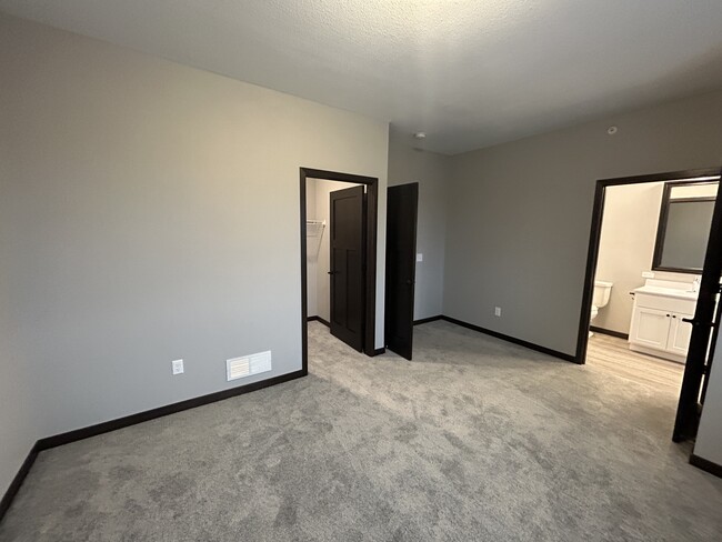 Primary Bedroom with Walk-In Closet - 3060 Bluestem Trl