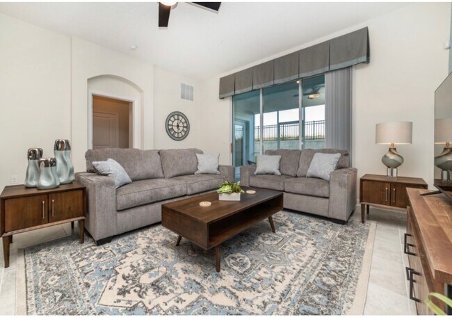 Building Photo - BEAUTIFUL CHAMPIONS GATE 2 BED 2 BATH COND0  w/GARAGE - FULLY FURNISHED - 12 MONTH RENTAL