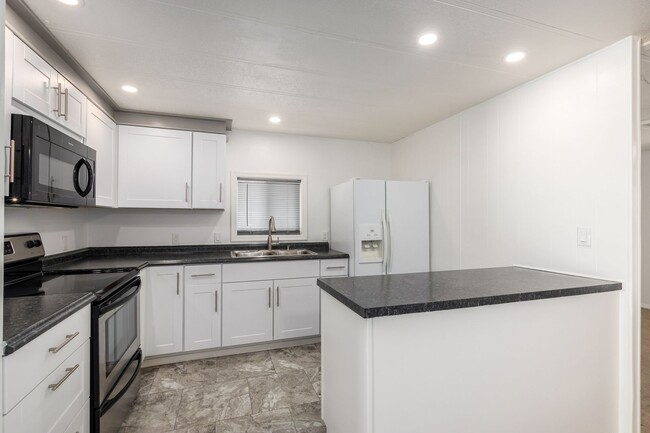 Building Photo - Remodeled 2-Bedroom, 2-Bath Home in Gated ...