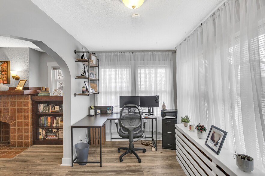 Versatile bonus room ideal for a sunroom, home office, reading nook, or creative space. - 203 Richbarn