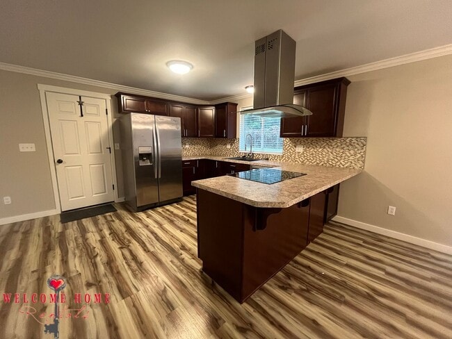 Building Photo - Remodeled rambler, no carpet, with HUGE fenced yard!!