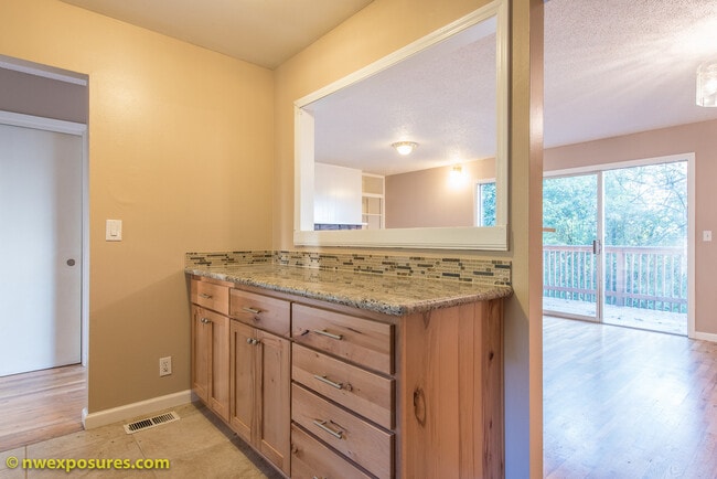 Building Photo - Charming 4-Bedroom Home with Dual Decks an...
