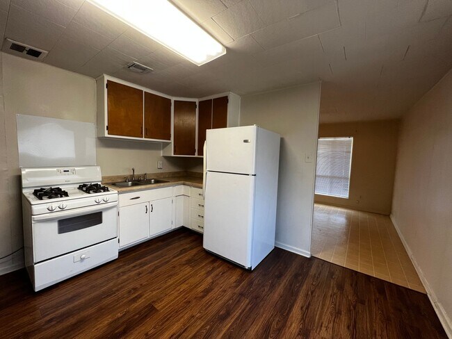 Building Photo - 3 Bedroom, 1.5 Bathroom, Brick Home with yard and Storage Building