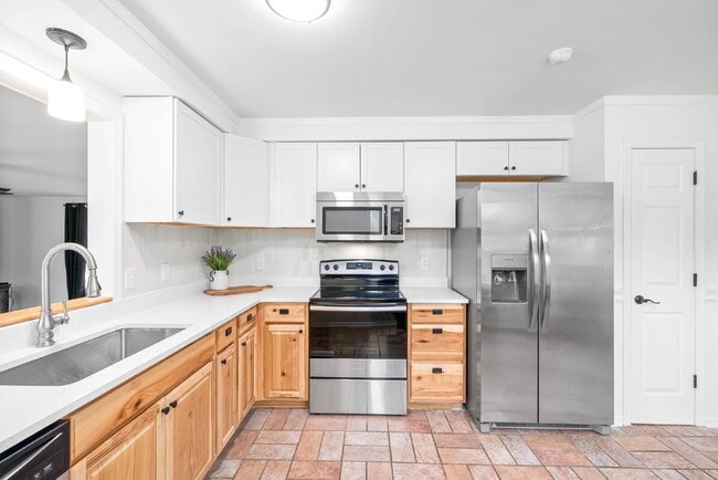 Building Photo - If you’ve been searching for a home that offers both modern updates and practical space, this one...