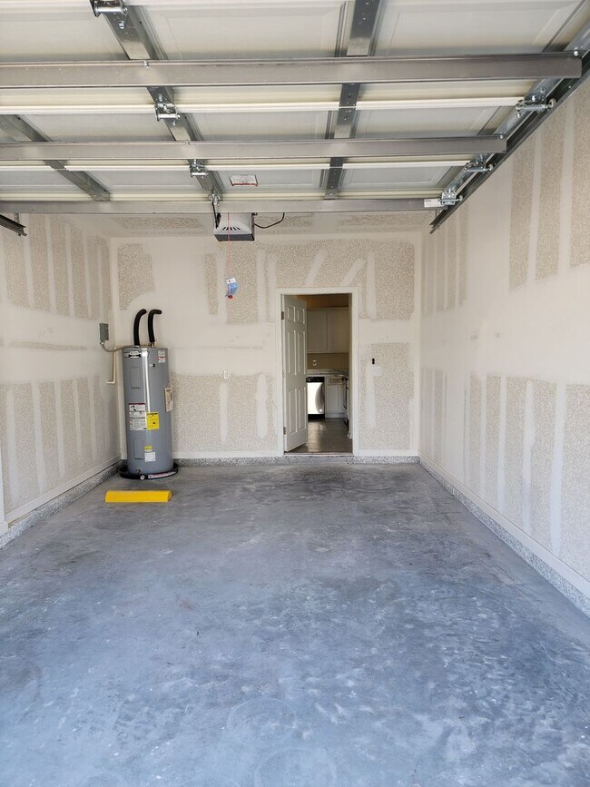 Building Photo - New beautiful Three bedroom Two and a half bath two-story townhome