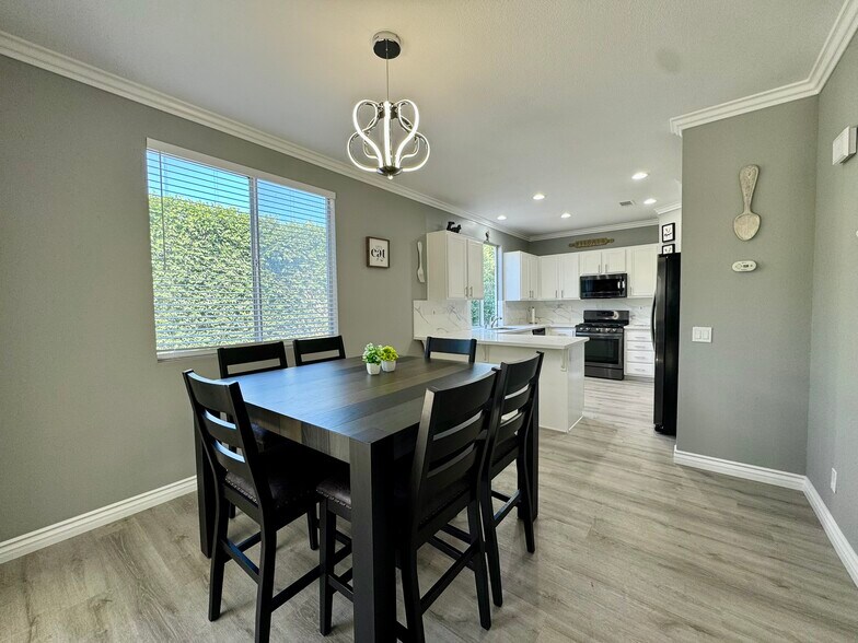Dining room looking into kitchen - 16224 Chadwick Ct