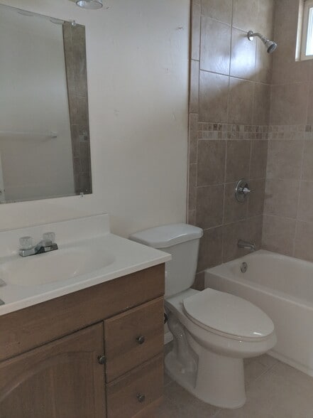 Tile main bath - 3614 Seacrest Way