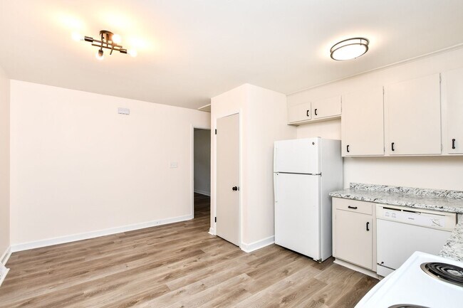 Building Photo - Tour Today! Beautiful redesigned corner co...
