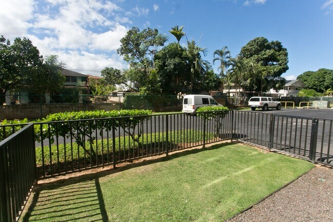 Building Photo - Plantation Town Apartments #112