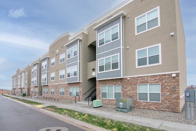 Building Photo - Up to one month free! 1-Bedroom Condos at ...