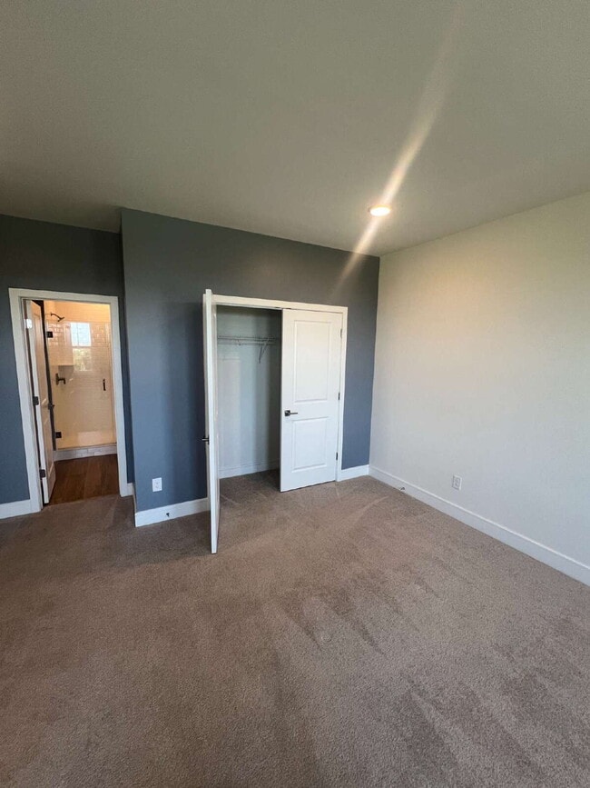 Building Photo - Brand-New Luxury 3BR Townhome-Style Condo ...