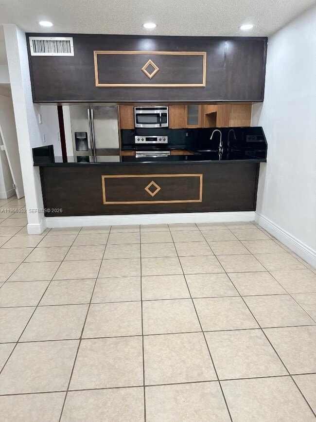 Building Photo - 7205 W 3rd Ave