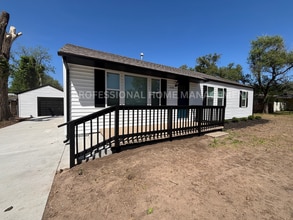 Building Photo - Don’t miss this opportunity! A Stylish Updated 4 Bedroom Home That’s Ready for You to Move Right In!