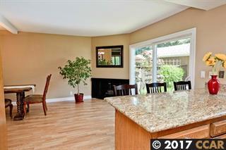 kitchen to sitting/dining area with fireplace - 133 Lawnview Cir