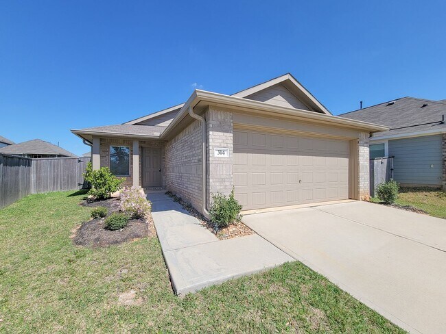 Building Photo - This single-story home has a comfortable layout with three bedrooms and a living area all on one ...