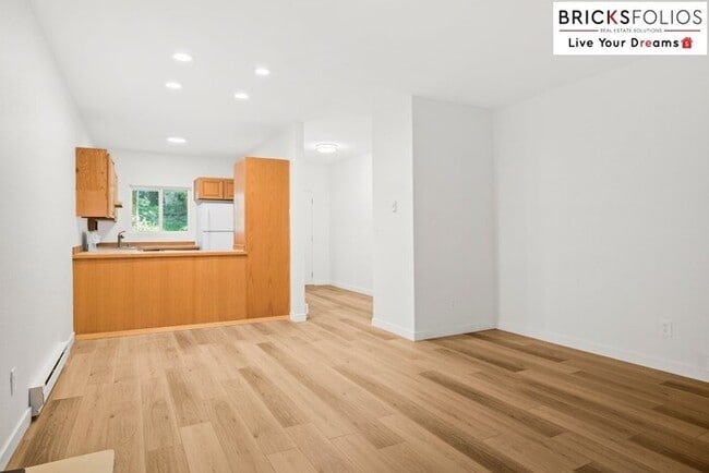 Building Photo - Live Steps from Microsoft | Stylish 2BR Condo with Fireplace & Parking