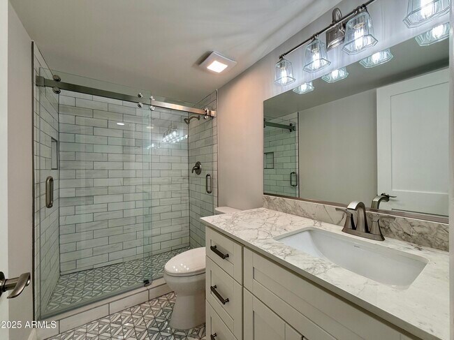 Building Photo - 7930 E Camelback Rd