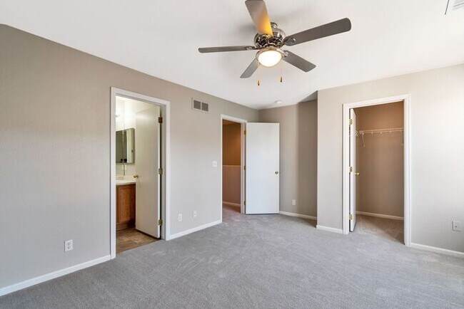 Building Photo - 3BR Townhome Near DIA & Light Rail | New Carpet, Garage & Fenced Patio