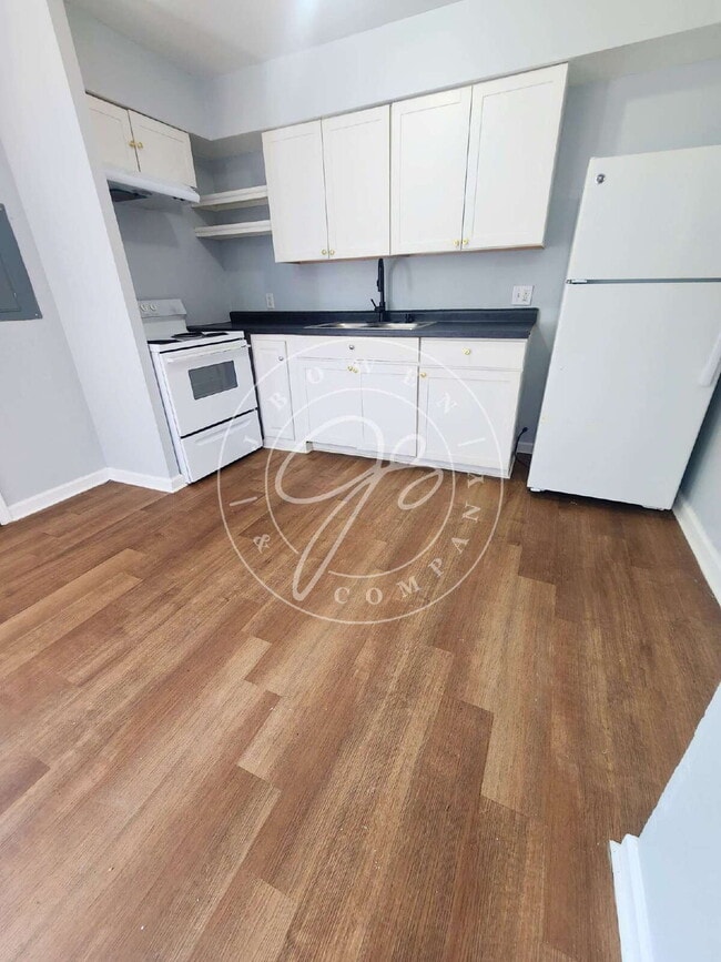Building Photo - 4-bedroom, 1.5-bath home offers updates throughout