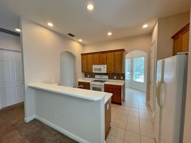 Building Photo - 3BR|3BA Palencia Patio Home