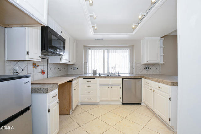 Building Photo - 3831 E Ave T 8