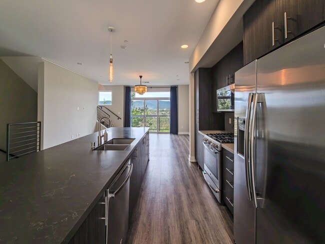 Building Photo - Modern Luxury Condo with Panoramic Views | 3-Story Condo + Private Rooftop Deck