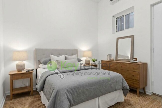 Building Photo - Rare Renovated 3BR/2BA Townhouse with Private Yard & NYC Views