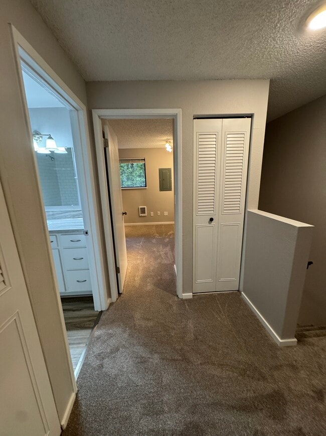 Building Photo - Fully Renovated 2 bedroom, 1.5 bath Apartment with New Appliances and Separate Garage!  Fully Rem...