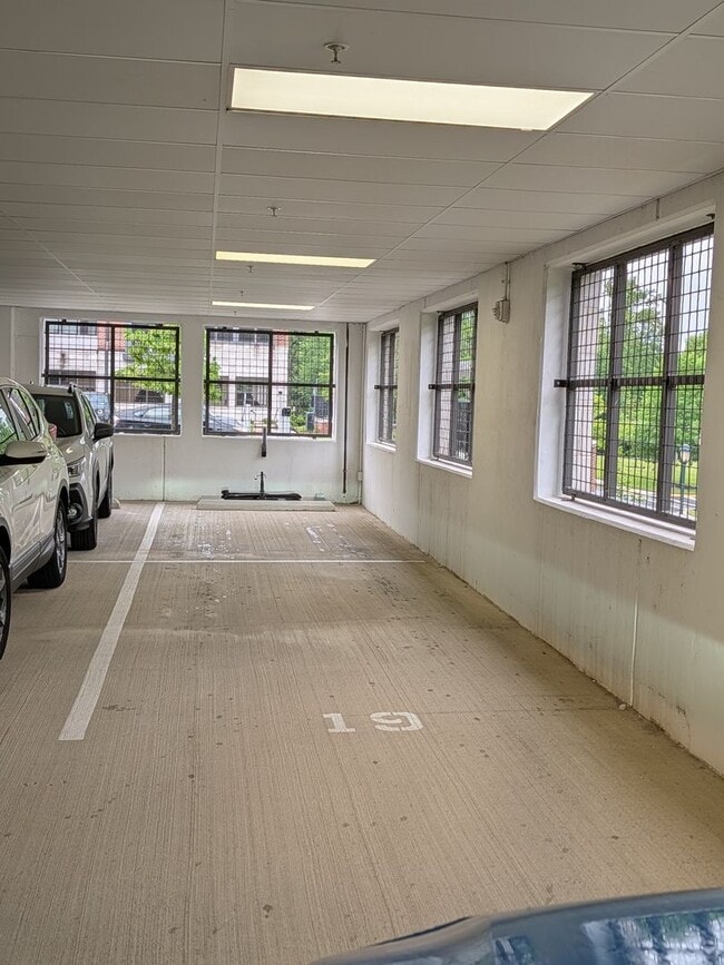 Building Photo - Sophisticated Rockville Corner Condo with Resort-Style Amenities, 2 Garage Parking Spaces