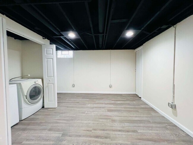 Building Photo - Spacious 4-Bedroom Home with Finished Basement & Attached Garage