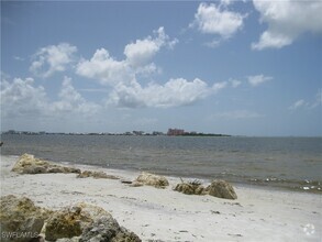 Building Photo - 20071 Sanibel View Cir