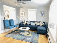 Building Photo - Coastal Charm Meets Comfort — Fully Furnis...