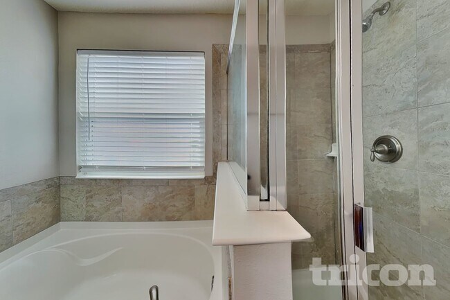 Building Photo - 7105 Feather Wood Dr