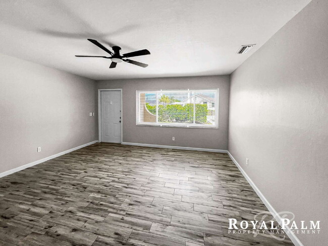 Building Photo - Tree-Lined 2BR/1BA Fort Myers Duplex with Fenced Yard, Storage Shed & In-Unit Laundry!