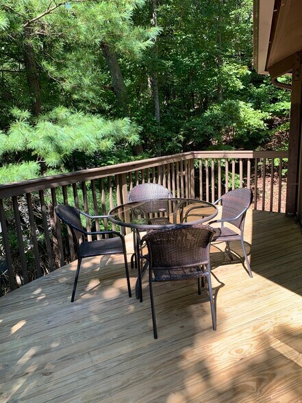 Enjoy outdoor dining on the deck - 149 Treetop Knl Dr