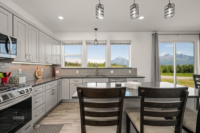Building Photo - Premium 4BR Rental in The Ranch | Stunning Mountain Views | Easy Community Location | Automatic G...