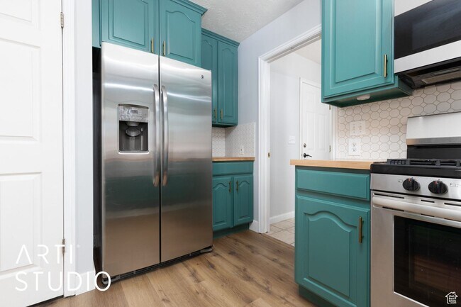 Building Photo - Spacious 5-Bedroom Home in Morgan – $500 O...