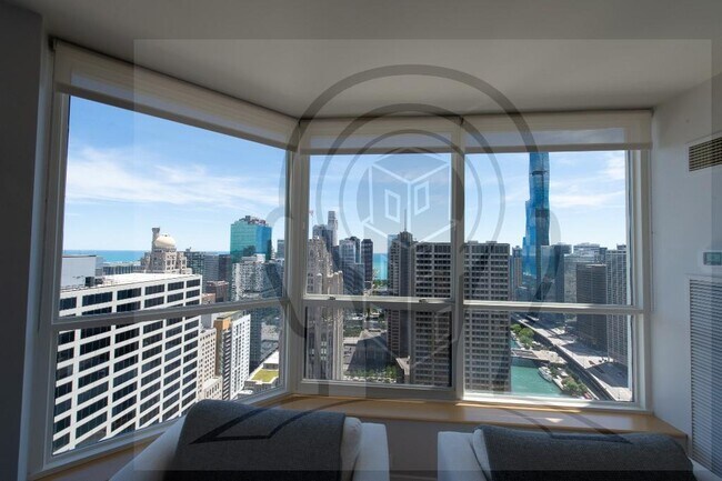 Building Photo - Stunning 46th Floor, 2 bedroom condo, right on the Chicago River