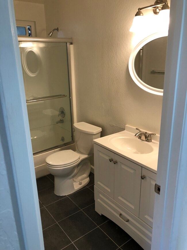 one of 2 full baths -hall - 1224 Sir Francis Drake Blvd