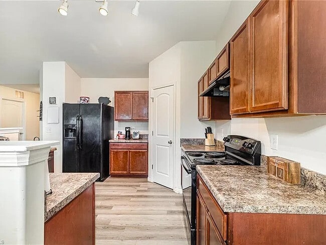 Building Photo - Earn Wealth While Leasing - Like a Homeown...
