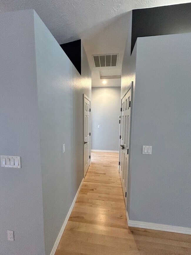 Building Photo - Spacious Duplex with 3-Car Garage & Private Patio!