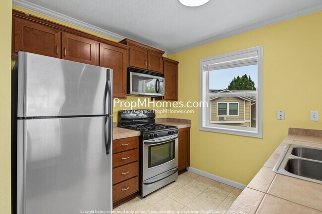 Building Photo - Two Bedroom Condo in the Heart of Bethany!
