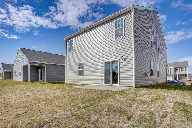 Building Photo - Modern 5-Bedroom Home Near Troutman – Show...